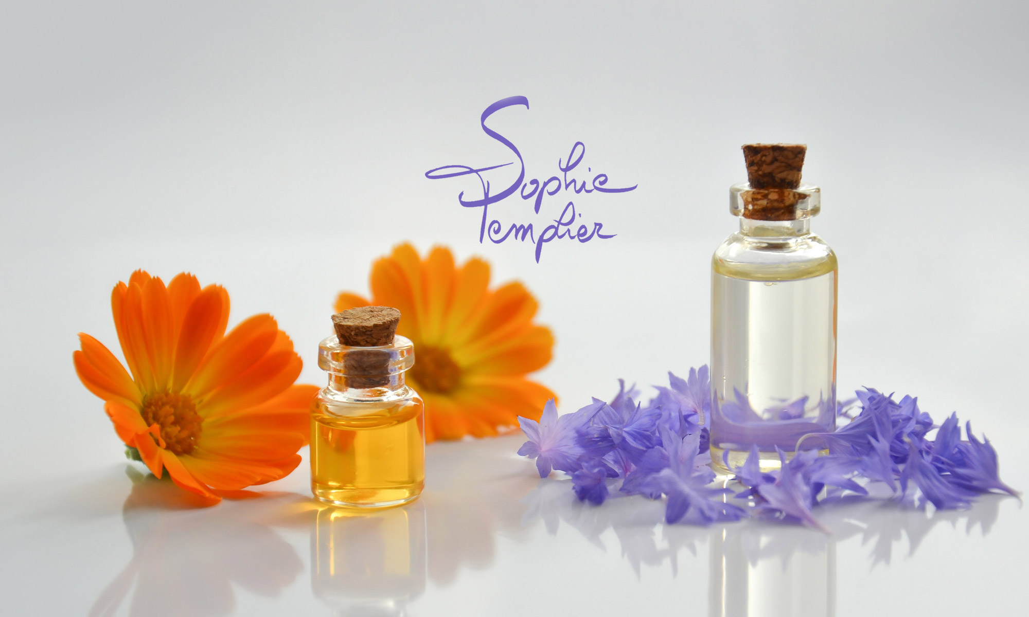 Fleurs et flacons d'aromathérapie
